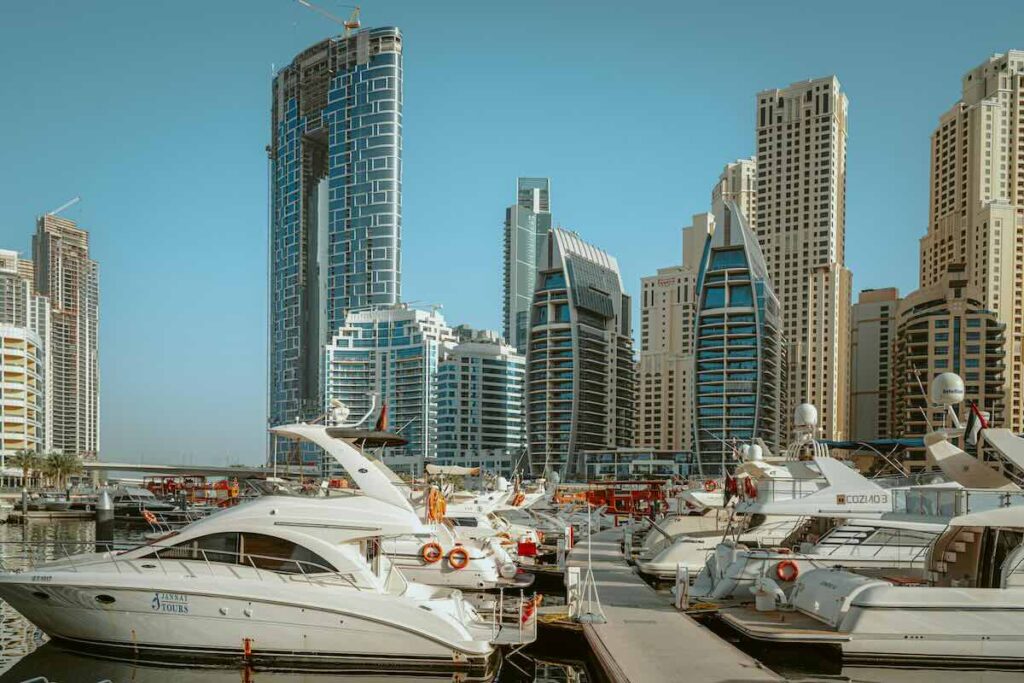 dubai growing bigger than abu dhabi