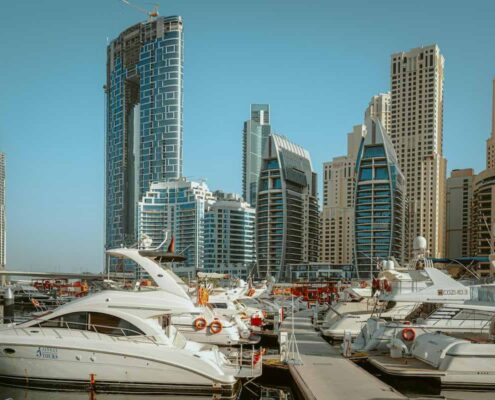dubai growing bigger than abu dhabi